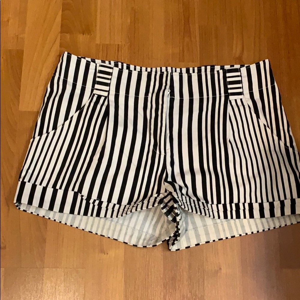 Black and white shorts.